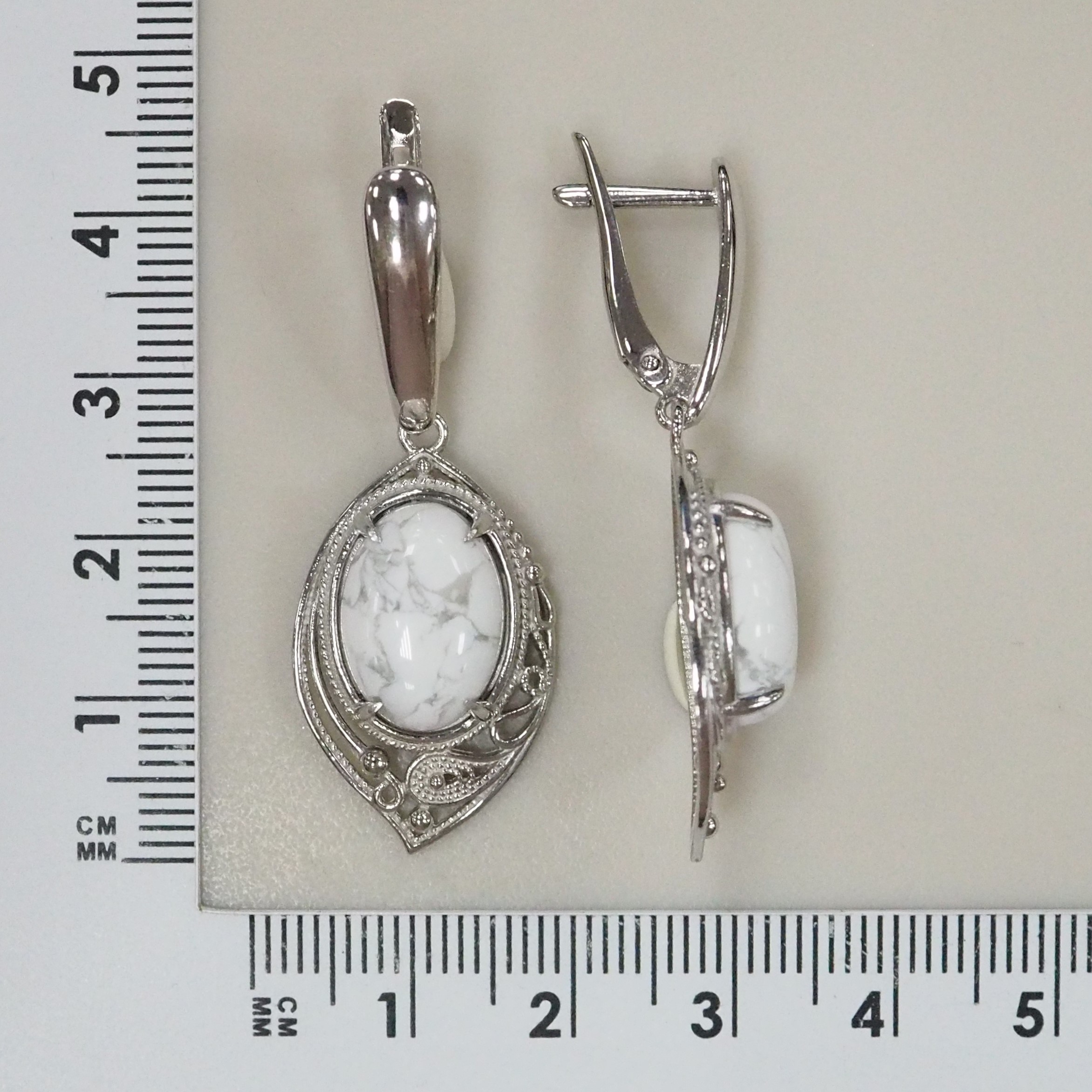 Серебряные серьги с кахолонгом